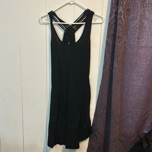 Black dress goes long in the back and short in the front